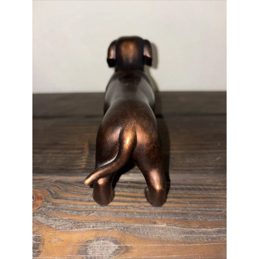 Vintage Dachshund wiener dog figurine copper toned Resin Doxie sausage Dog